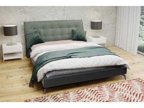 zielone tapicerowane łóżko