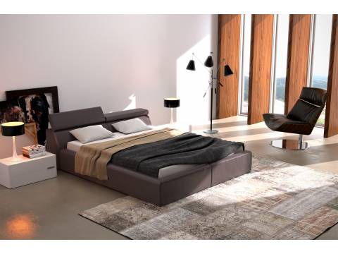 Czarne tapicerowane łóżko z regulowanymi zagłówkami